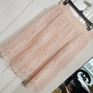 Knee length pink taffeta skirt
